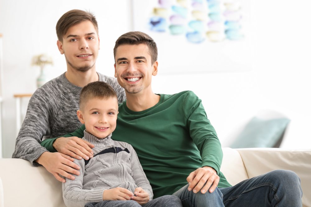 male gay couple with foster boy